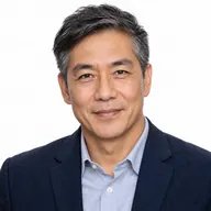Victor Huang desk portrait